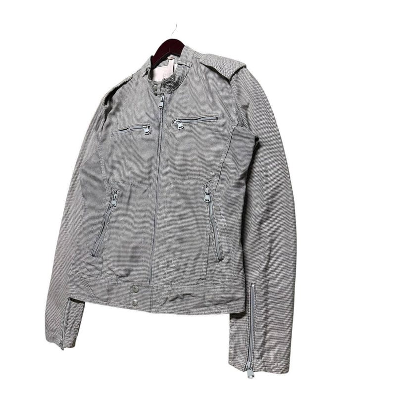 A vintage Diesel moto biker jacket with a checkered design featuring a full zip front, utility pockets and a streetwear aesthetic. Perfect for casual layering unisex fashion.