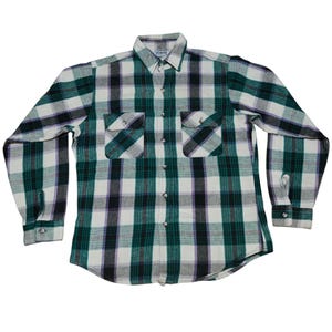 Vintage Five Brother flannel shirt made in USA with green black purple  and white plaid pattern, button down long sleeve cotton workwear top from the 1990s, classic outdoor style for men, grunge and streetwear fashion, warm fall winter shirt with dual chest pockets and durable construction, retro casual staple for collectors and flannel lovers.