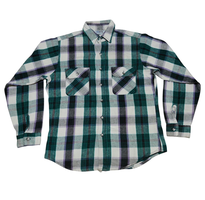 Vintage Five Brother flannel shirt made in USA with green black purple  and white plaid pattern, button down long sleeve cotton workwear top from the 1990s, classic outdoor style for men, grunge and streetwear fashion, warm fall winter shirt with dual chest pockets and durable construction, retro casual staple for collectors and flannel lovers.