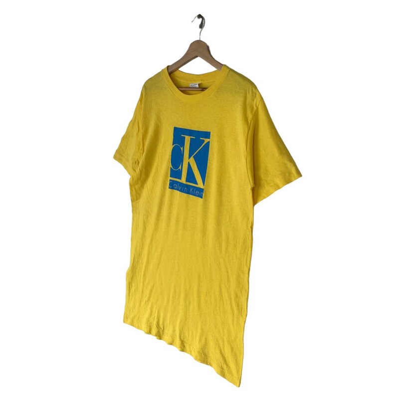 Vintage Calvin Klein Graphic Tshirt Medium Size Yellow Color Big Logo