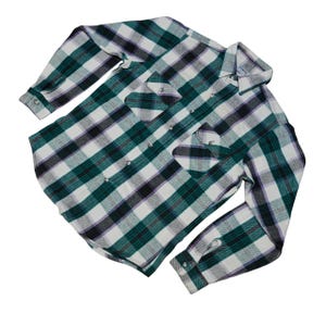Vintage Five Brother flannel shirt made in USA with green black purple  and white plaid pattern, button down long sleeve cotton workwear top from the 1990s, classic outdoor style for men, grunge and streetwear fashion, warm fall winter shirt with dual chest pockets and durable construction, retro casual staple for collectors and flannel lovers.