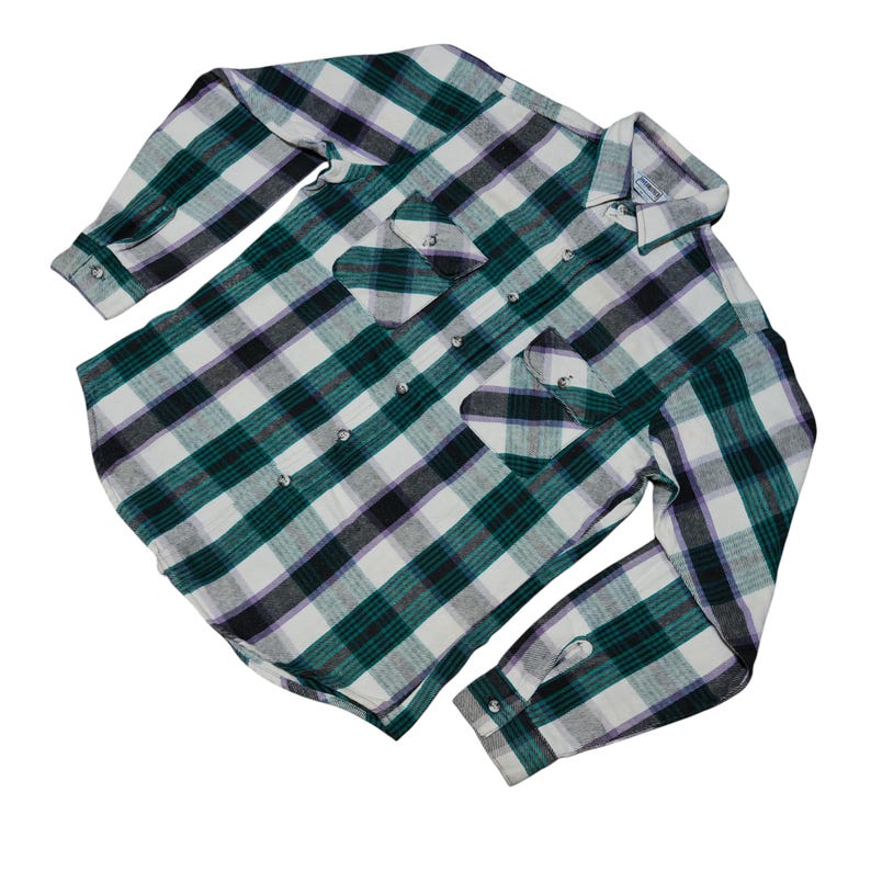 Vintage Five Brother flannel shirt made in USA with green black purple  and white plaid pattern, button down long sleeve cotton workwear top from the 1990s, classic outdoor style for men, grunge and streetwear fashion, warm fall winter shirt with dual chest pockets and durable construction, retro casual staple for collectors and flannel lovers.