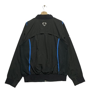 May include: Black windbreaker jacket with blue accents and a Nike logo on the back.