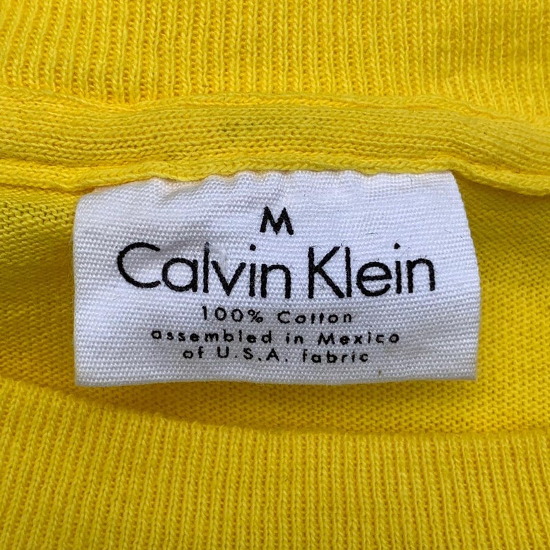 Vintage Calvin Klein Graphic Tshirt Medium Size Yellow Color Big Logo