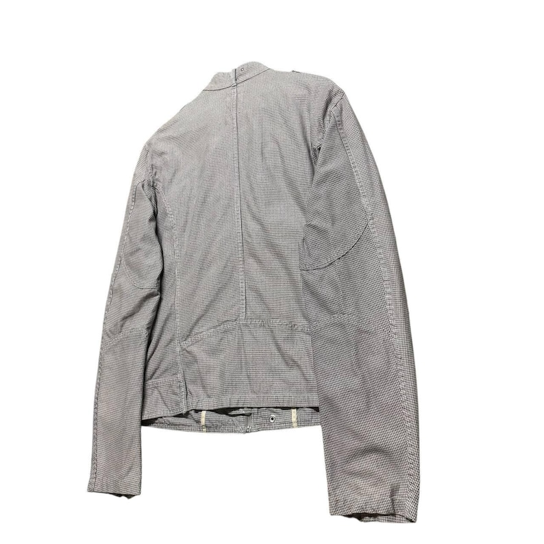 A vintage Diesel moto biker jacket with a checkered design featuring a full zip front, utility pockets and a streetwear aesthetic. Perfect for casual layering unisex fashion.