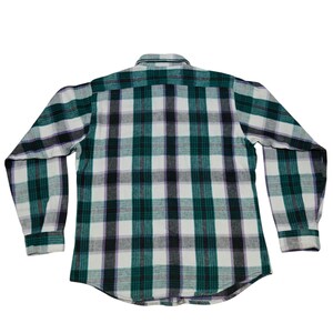 Vintage Five Brother flannel shirt made in USA with green black purple  and white plaid pattern, button down long sleeve cotton workwear top from the 1990s, classic outdoor style for men, grunge and streetwear fashion, warm fall winter shirt with dual chest pockets and durable construction, retro casual staple for collectors and flannel lovers.