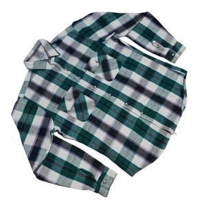 Vintage Five Brother flannel shirt made in USA with green black purple  and white plaid pattern, button down long sleeve cotton workwear top from the 1990s, classic outdoor style for men, grunge and streetwear fashion, warm fall winter shirt with dual chest pockets and durable construction, retro casual staple for collectors and flannel lovers.