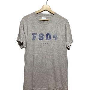 Camiseta vintage de patineta de cuatro estrellas, talla mediana