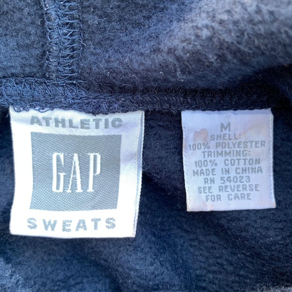レトロ　ギャップ　GAP フリース　パーカー　フーディ　古着 GAP（ギャップ）の「Gap ロゴフリース プルオーバーパーカー(ユニ
