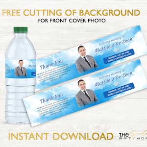 May include: Two blue and white water bottle labels with a white cloud background. The labels feature a man in a suit and tie, the text "In loving memory of Matthew De Leon", and the dates "Sunrise: July 09, 1987 Sunset: October 01, 2019". The labels also include the text "Thank You" and a message of sympathy.