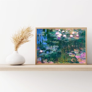 May include: A framed painting of a pond with water lilies. The water is a vibrant blue and green, with lily pads and white flowers. The background is a soft green and blue.