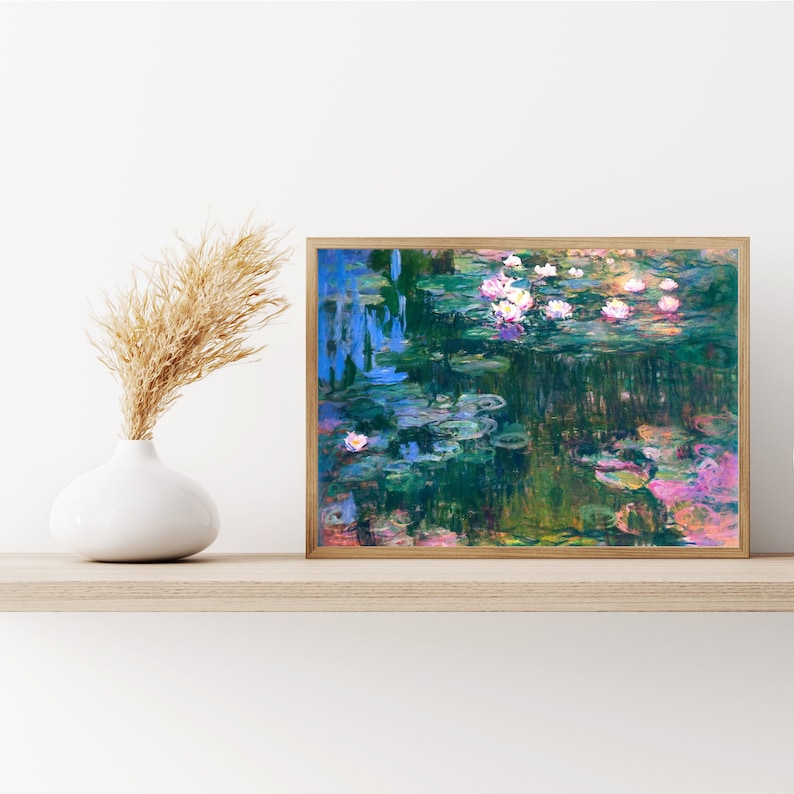 May include: A framed painting of a pond with water lilies. The water is a vibrant blue and green, with lily pads and white flowers. The background is a soft green and blue.