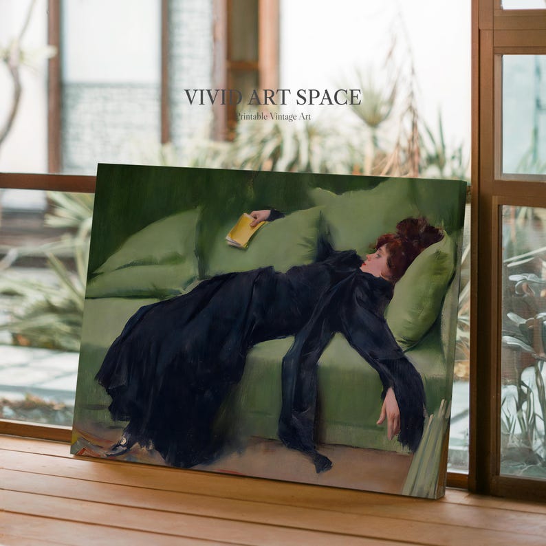 May include: A vintage art print depicting a woman in a black dress resting on a green sofa, holding a yellow book. The artwork has a classic, painterly style, with the text "VIVID ART SPACE" in the upper left corner.