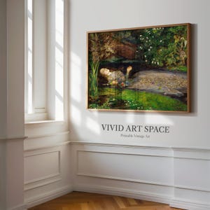 May include: A framed vintage art print depicting a woman in a pond, surrounded by plants and flowers. The painting has a gold frame and is hung on a white wall. The text "VIVID ART SPACE" is printed below the artwork.