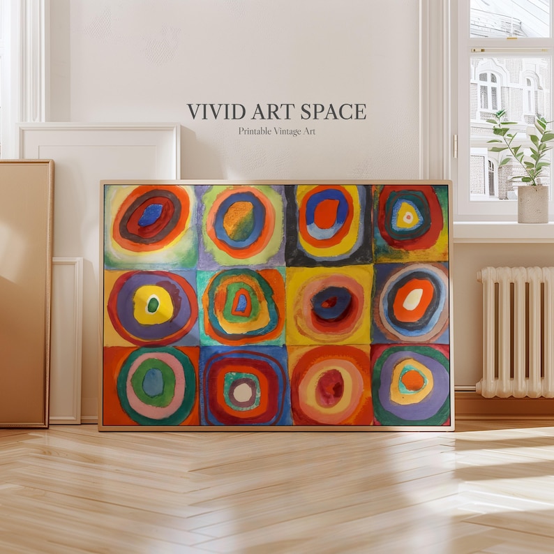 May include: A framed abstract painting with colorful concentric circles in squares. The artwork features a variety of colors including red, blue, yellow, and green. The text "VIVID ART SPACE Printable Vintage Art" is above the painting.