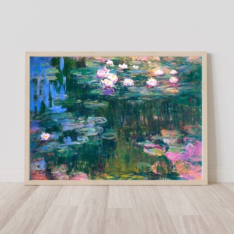 May include: A framed painting of water lilies in a pond. The water lilies are white with pink centers and are surrounded by green lily pads. The water is a light blue color and reflects the sky. The painting is done in a style reminiscent of Impressionism.