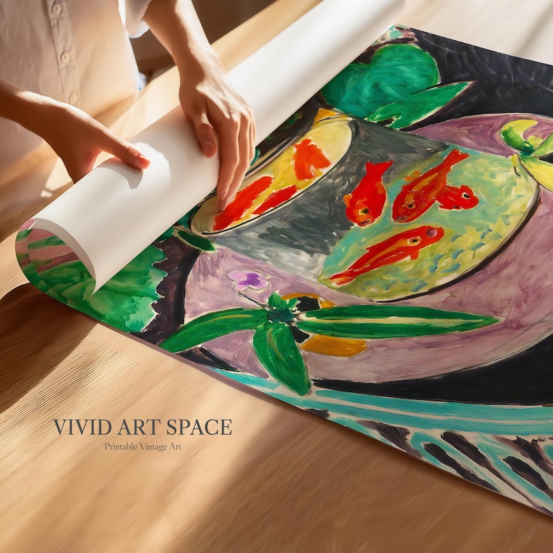 May include: A vintage art print featuring a bowl of goldfish with a green plant in the foreground. The bowl is on a purple and pink background with black and blue accents. The print is titled "VIVID ART SPACE" and says "Printable Vintage Art" underneath.