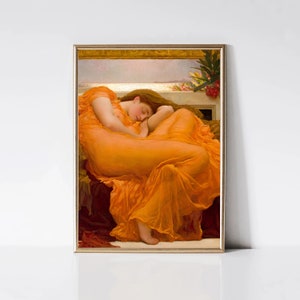 May include: A framed art print featuring a classical painting of a woman in a flowing orange dress, asleep. The artwork has a gold frame and depicts a serene scene with warm tones.