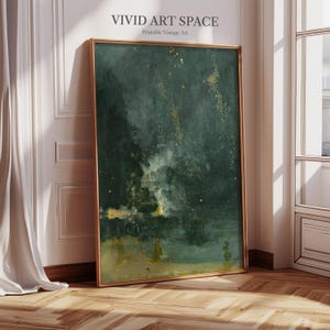 May include: A framed abstract art print with a dark teal and gold color palette. The artwork features a textured appearance with gold flecks and a light, cloud-like formation. The frame is a warm gold color, and the text "VIVID ART SPACE Printable Vintage Art" is visible.