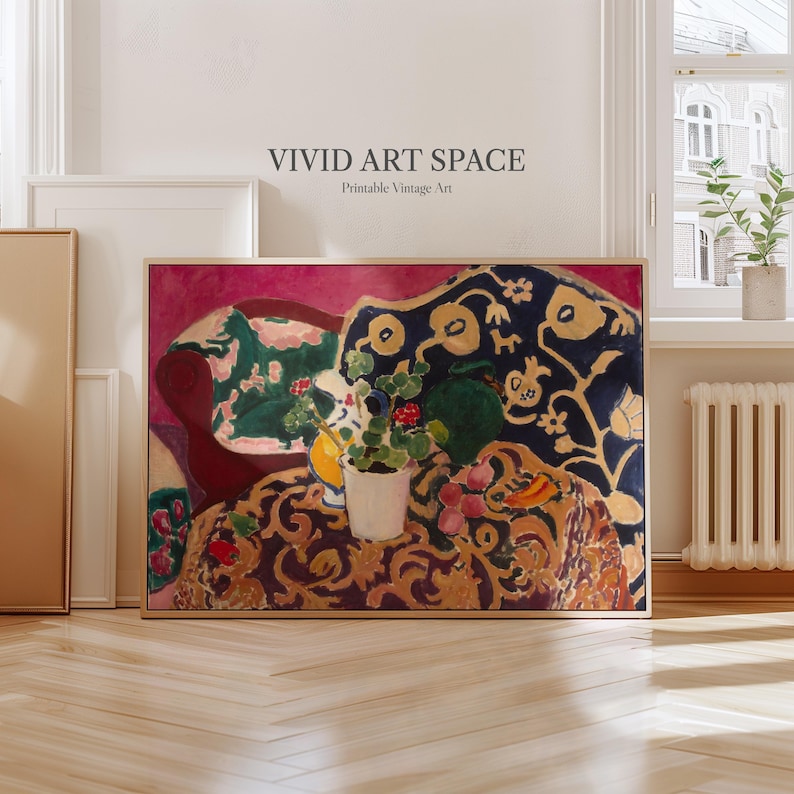 May include: A framed print of a colorful abstract painting. The artwork features a still life with a vase of flowers, a patterned couch, and the text "VIVID ART SPACE". The color palette includes shades of pink, blue, green, and gold.