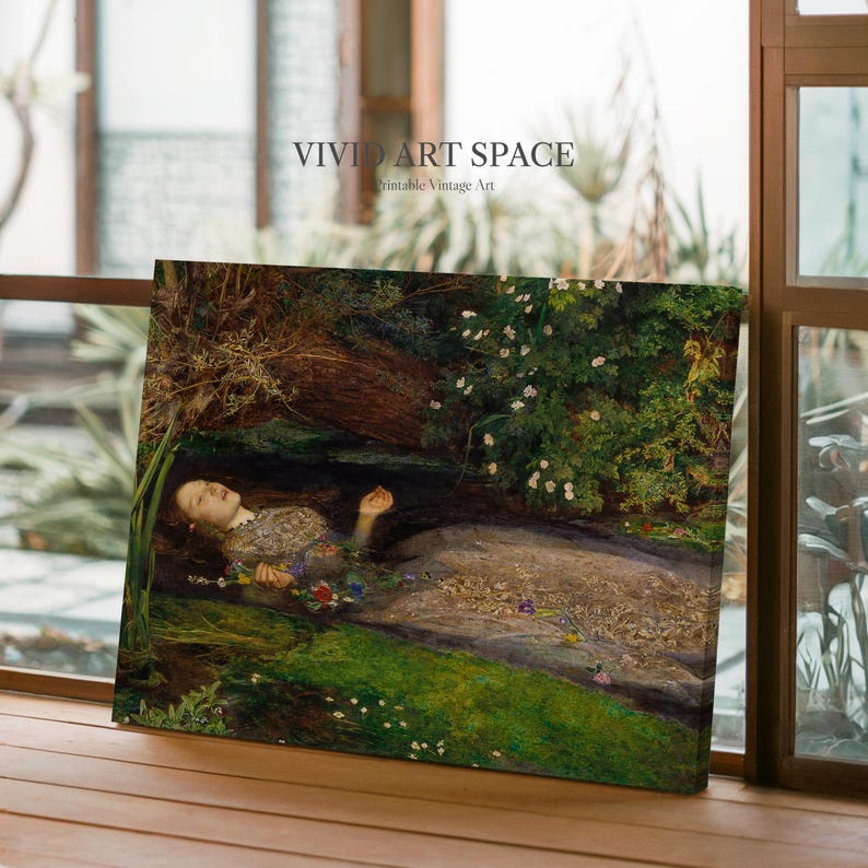 May include: A canvas print of a Pre-Raphaelite painting depicting a woman in water, encircled by flowers and foliage. The artwork has a vintage style, with gentle hues and intricate detail. The text "VIVID ART SPACE Printable Vintage Art" is in the upper left corner.