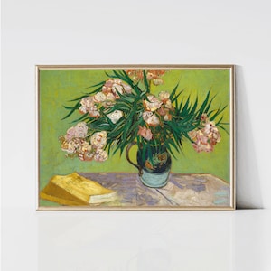 May include: A painting of a vase filled with pink and white flowers with green leaves. The vase is blue and green and sits on a table with a yellow book.