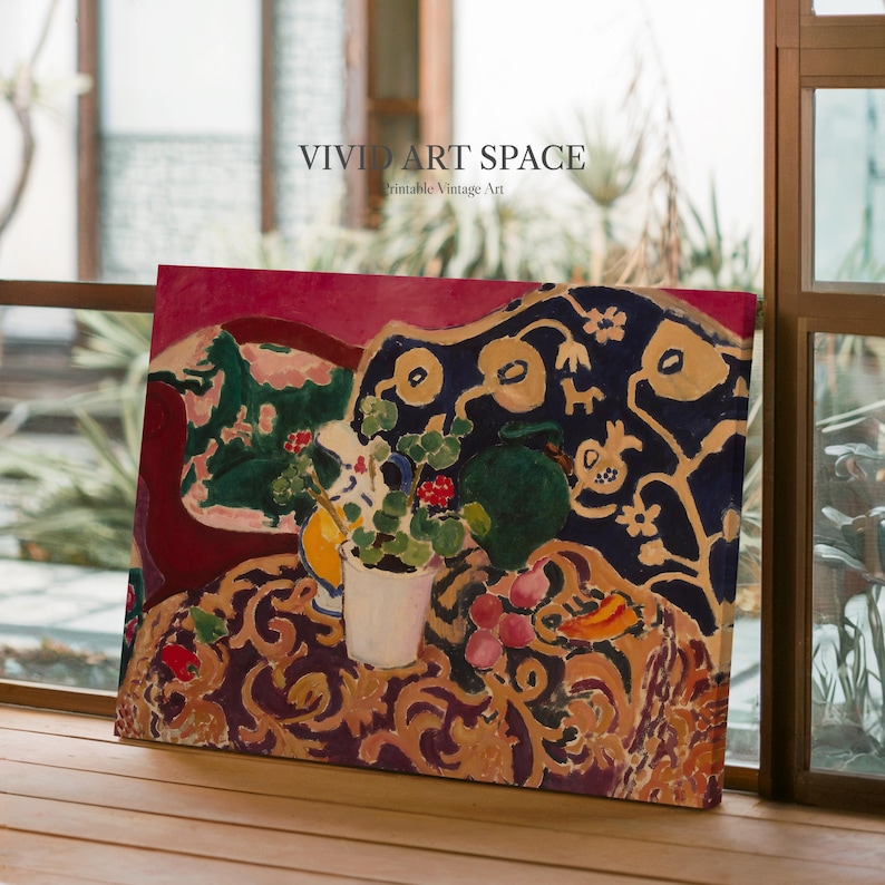 May include: A colorful, vintage-style print of a still life painting. The artwork features a table with a patterned tablecloth, a vase of flowers, and other decorative elements. The text "VIVID ART SPACE Printable Vintage Art" is visible.
