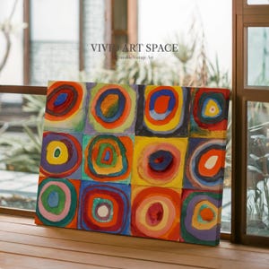 May include: A colorful abstract painting featuring a grid of squares, each containing concentric circles in various colors. The artwork includes vibrant hues of red, blue, yellow, and green. The text "VIVID ART SPACE Printable Vintage Art" is visible in the upper portion of the image.