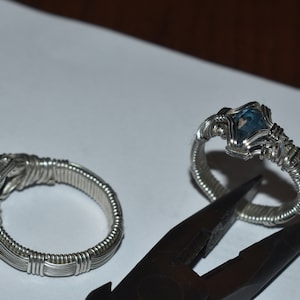 little blue. teal kyanite wire wrapped ring in sterling silver