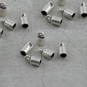 20 tapones para cordones de cuero redondos, paracord, borlas, collares, pulseras y accesorios de joyería, precio al por mayor ZM192 AS