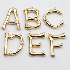 Colgante con letras del alfabeto, dijes con iniciales, chapado en oro para mujer y hombre, letra, dije con inicial, venta al por mayor, ZM610 GO