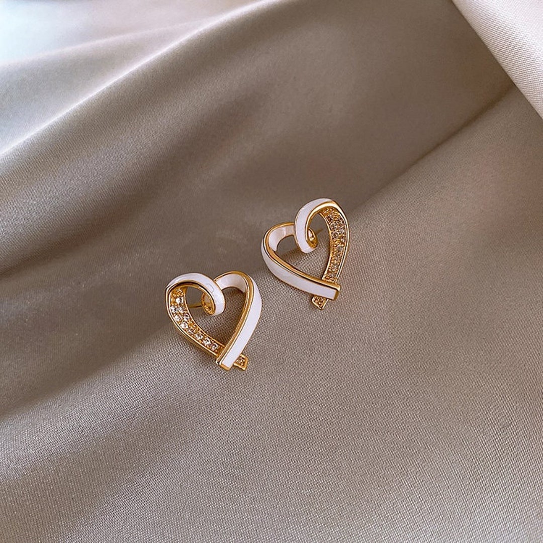 Buy quality Opulent gold heart earrings in Pune
