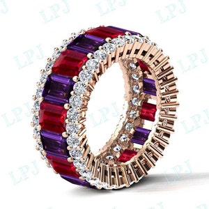 May include: A rose gold band ring with a double row of alternating red and purple baguette-cut gemstones and a row of round white gemstones.