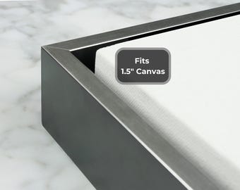 Marco flotante negro con borde plateado cepillado para lienzo de 1,5" de profundidad