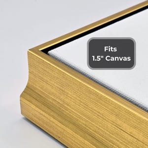 May include: Close-up of a gold-colored picture frame corner. The frame is made of wood and has a textured surface. The text on the image says "Fits 1.5" Canvas".