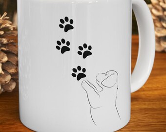 Understated Dog Paw Mug.11oz white ceramic coffee-tea cup for the dog lover in your life. It might just be your favorite morning coffee mug.