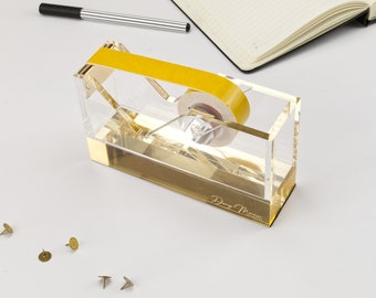 Gold tape dispenser