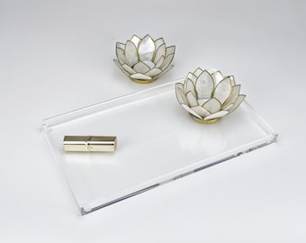 Acrylic tray for storing cosmetics, glasses or utensils on the desk