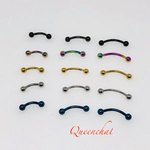 May include: A set of 10 curved barbell body jewellery pieces with different coloured balls. The colours include black, rainbow, gold, silver, and blue.