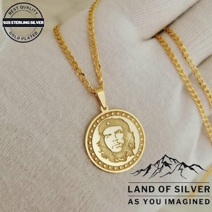 May include: Gold-plated 925 sterling silver chain necklace with a round pendant featuring a profile image of Che Guevara. The pendant is surrounded by a circle of stars. The text "LAND OF SILVER AS YOU IMAGINED" is printed below the pendant.