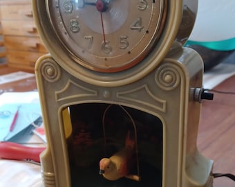 1950's Mastercrafters "Swinging Bird" Clock model no. 335 made in Chicago IL. Electric Mantle Clock ANIMATED LIGHTED John Lane Hancock