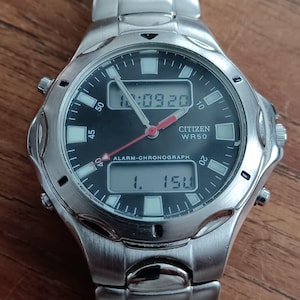 Citizen Watch C240-S75241 Chronograph Alarm Quartz Near Mint Condition Water Proof Stainless Steel WR 50 Sapphire Crystal Digital Analog