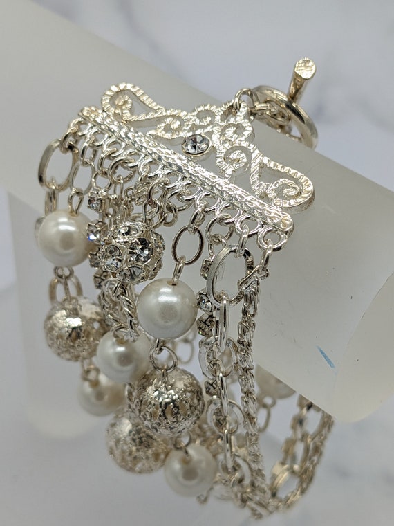 Silver Tone Multi Strand Chain Bracelet.