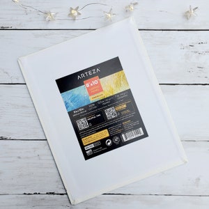 May include: A white 8x10 inch canvas panel from Arteza. The panel is 100% cotton and is primed and unprimed. It is 12.3 oz (350 g) and is made in the USA.