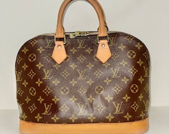 Authentic Louis Vuitton Alma Pm handbag datecode: VI0926