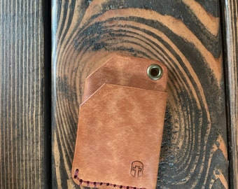 The Voyager slim front pocket card wallet made of full grain vegetable tanned genuine leather for 8 cards and some cash