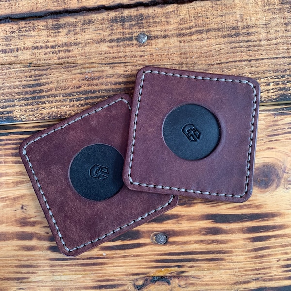 Skol drink coasters made of vegetable tanned full grain leather. Handmade leather coasters for kitchen, bar, dining room.