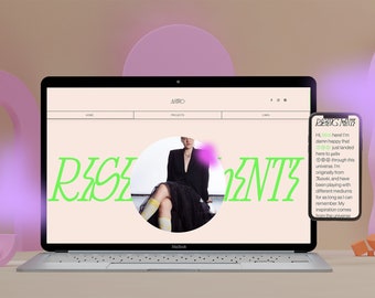 May include: A laptop computer screen displaying a website with the text "RESENT" in green letters. The website features a photo of a woman wearing a black blazer and a black skirt. The laptop is on a table with a pink and orange background.