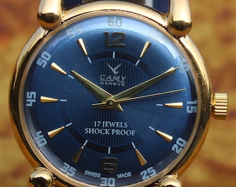 Reloj de pulsera antiguo vintage Camy Geneva de los años 80, fabricado en Suiza, FHF ST96, 17 joyas, mecánico, de cuerda manual, esfera azul, para hombre. Envío gratuito a todo el mundo.