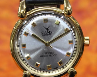 Reloj de pulsera Camy Geneva FHF ST96 con mecanismo de cuerda manual y 17 joyas, fabricado en Suiza, años 80